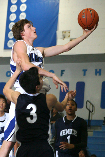 Junior Colton Chambers drives to the hoop during Monday's 73-50 win over Venice.	 Photo: Rich Schmitt/Staff Photographer